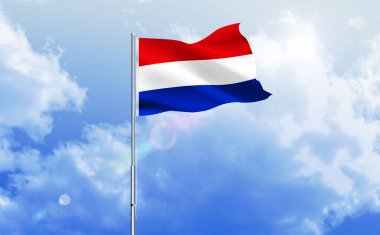 Hollanda bayrağı dalgalanır parlak mavi gökyüzünde