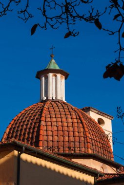 San Girolamo (St Jerome) renaissance church and ancient dome covered with terracotta tiles in the historic center of Lucca