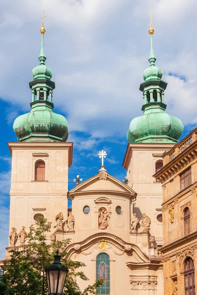 stock image Baroque art and architecture in Prague. 18th century Church of St Havel with onion dome twin bell towers