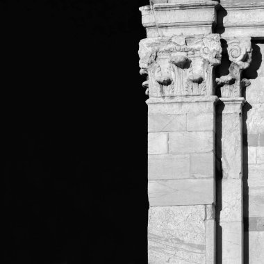Classical architecture in Lucca. Pillar and capital from renaissance facade of St John Church,  (Black and White with copy space)