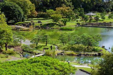 Tokyo, JAPAN, OCTOBER 21, 2023 - The beautiful and ancient Kyu-Shiba-rikyu Garden in Tokyo from Hamamatsucho Station observation deck