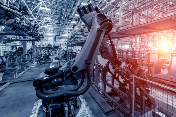 Fabrika robot kolu silah fabrikasındaki üretim hattı için..