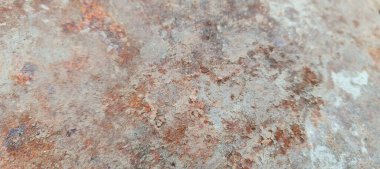 Zamanın derinliklerinde, eski bir demir yüzey yolculuğunun işaretlerini taşır. Paslanma ve aşınma iç içe geçerek eskimiş güzelliğin dokulu bir duvar halısı oluşturur. Bu vintage fon, endüstriyel dayanıklılık ve paslı doku arka planının hikayesini anlatıyor.