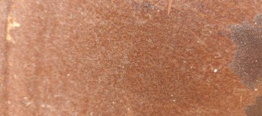 Zamanın derinliklerinde, eski bir demir yüzey yolculuğunun işaretlerini taşır. Paslanma ve aşınma iç içe geçerek eskimiş güzelliğin dokulu bir duvar halısı oluşturur. Bu vintage fon, endüstriyel dayanıklılık ve paslı doku arka planının hikayesini anlatıyor.