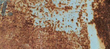 Zamanın derinliklerinde, eski bir demir yüzey yolculuğunun işaretlerini taşır. Paslanma ve aşınma iç içe geçerek eskimiş güzelliğin dokulu bir duvar halısı oluşturur. Bu vintage fon, endüstriyel dayanıklılık ve paslı doku arka planının hikayesini anlatıyor.