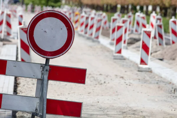 Road closed sign and safety pylons because of road reconstruction in the Netherlands