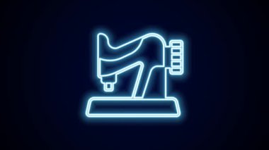 Parlayan neon hattı dikiş makinesi simgesi siyah arkaplanda izole edildi. 4K Video hareketli grafik canlandırması.