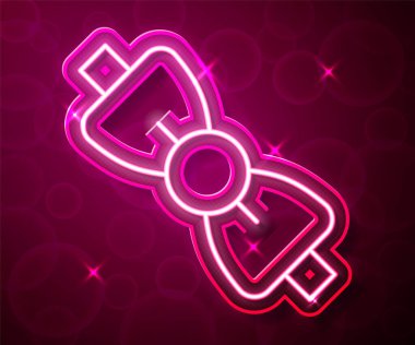 Parlayan neon çizgisi papyon simgesi kırmızı arkaplanda izole edildi. Vektör