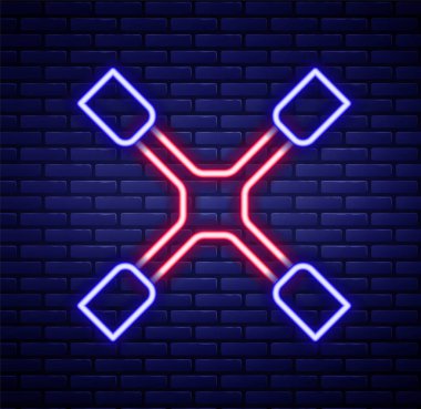 Parlayan neon hattı tekerlek anahtarı simgesi tuğla duvar arka planında izole edildi. Tekerlek desteği. Renkli taslak konsepti. Vektör