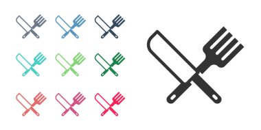 Beyaz arka planda siyah haçlı bıçak ve çatal simgesi var. Çatal bıçak sembolü. Simgeleri renklendirin. Vektör.