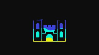 Yellow Castle icon isolated on black background. Medieval fortress with a tower. Protection from enemies. Reliability and defense of the city. 4K Video motion graphic animation.