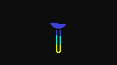 Yellow Lollipop icon isolated on black background. Food, delicious symbol. 4K Video motion graphic animation.