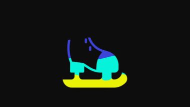 Yellow Skates icon isolated on black background. Ice skate shoes icon. Sport boots with blades. 4K Video motion graphic animation.