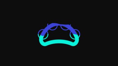 Yellow Musical instrument percussion tambourine, with metal plates icon isolated on black background. 4K Video motion graphic animation.