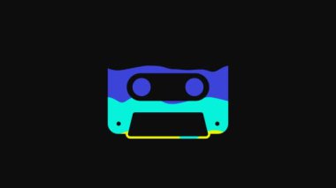 Yellow Retro audio cassette tape icon isolated on black background. 4K Video motion graphic animation.