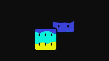 Yellow Game dice icon isolated on black background. Casino gambling. 4K Video motion graphic animation.