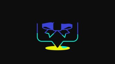Yellow Gift bow icon isolated on black background. 4K Video motion graphic animation.