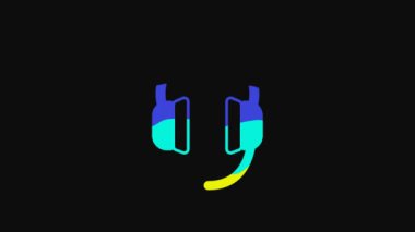 Yellow Headphones icon isolated on black background. Earphones. Concept for listening to music, service, communication and operator. 4K Video motion graphic animation.