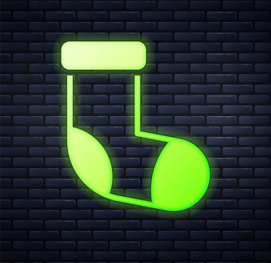 Parlayan neon renkli Noel çorap ikonu tuğla duvar arkasında izole edilmiş. Mutlu Noeller ve mutlu yıllar. Vektör