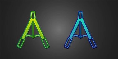 Green and blue Air blower bellows icon isolated on black background.  Vector