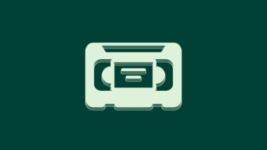 Beyaz VHS video kaset ikonu yeşil arkaplanda izole edildi. 4K Video hareketli grafik canlandırması.