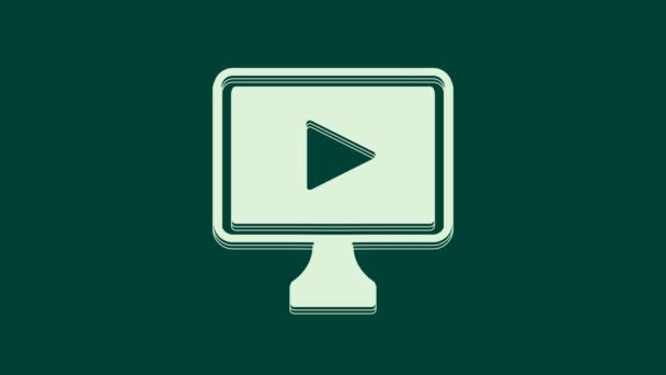 ホワイトオンライン再生ビデオアイコンは緑の背景に隔離されます プレイサイン付きのフィルムストリップ 4Kビデオモーショングラフィックアニメーション — ストック動画