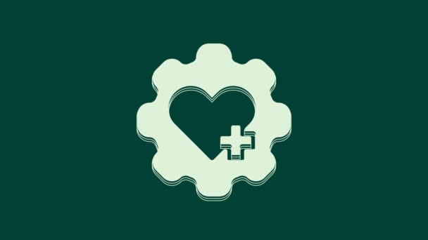 Białe Serce Ikoną Krzyża Zielonym Tle Pierwsza Pomoc Znak Opieki — Wideo stockowe