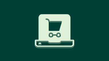 Ekran dizüstü bilgisayarındaki beyaz alışveriş arabası yeşil arka planda izole edilmiş. Konsept e-ticaret, e-ticaret, online iş pazarlama. 4K Video hareketli grafik canlandırması.