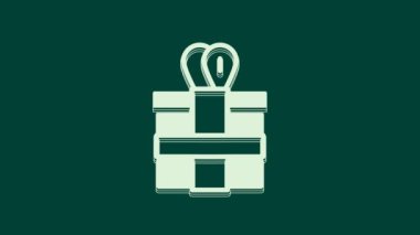 Yeşil arkaplanda beyaz hediye kutusu simgesi izole edildi. 4K Video hareketli grafik canlandırması.