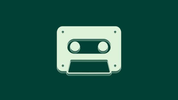 緑の背景に隔離されたホワイトレトロオーディオカセットテープアイコン 4Kビデオモーショングラフィックアニメーション — ストック動画