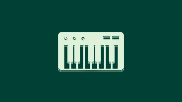 緑色の背景に分離された白い音楽シンセサイザーアイコン 電子ピアノ 4Kビデオモーショングラフィックアニメーション — ストック動画