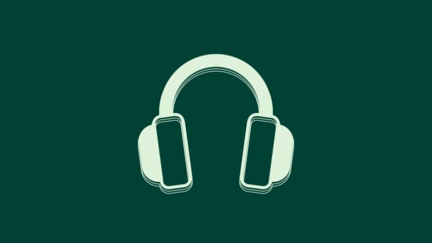 Białe Słuchawki Ikona Izolowane Zielonym Tle Słuchawki Koncepcja Słuchania Muzyki — Wideo stockowe