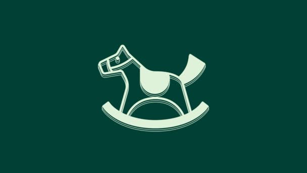 White Wooden Horse Saddle Swing Little Children Icon Isolated Green — Vídeo de Stock