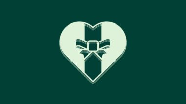 Yeşil arkaplanda beyaz hediye kutusu simgesi izole edildi. Mutlu Noeller ve mutlu yıllar. 4K Video hareketli grafik canlandırması.