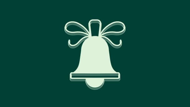 緑の背景に隔離されたホワイトメリークリスマスリンギングベルアイコン アラーム記号 サービスベル ハンドベル記号 4Kビデオモーショングラフィックアニメーション — ストック動画