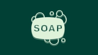 Yeşil arkaplanda beyaz sabun simgesi izole edildi. Köpüklü sabun çubuğu. 4K Video hareketli grafik canlandırması.