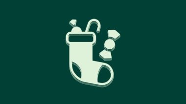 Beyaz Noel çorap ikonu yeşil arka planda izole edilmiş. Mutlu Noeller ve mutlu yıllar. 4K Video hareketli grafik canlandırması.