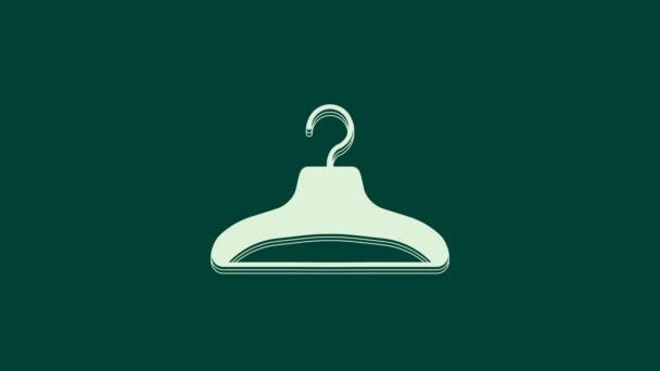 緑の背景に隔離されたホワイトハンガーのワードローブアイコン クロークルームのアイコン 衣類サービスのシンボル 洗濯ハンガーの看板 4Kビデオモーショングラフィックアニメーション — ストック動画