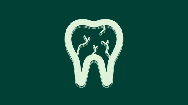 緑色の背景に分離された白い壊れた歯のアイコン 歯の問題のアイコン 歯のケアのシンボル 4Kビデオモーショングラフィックアニメーション — ストック動画