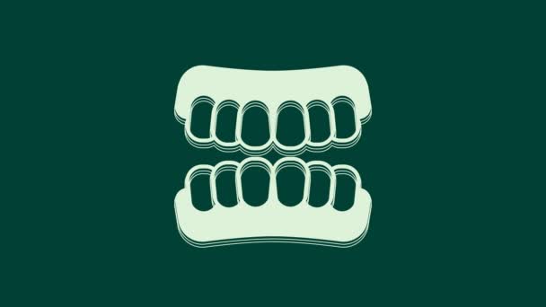 白色假牙模型图标孤立在绿色背景 上颚的牙齿 牙的概念 4K视频运动图形动画 — 图库视频影像