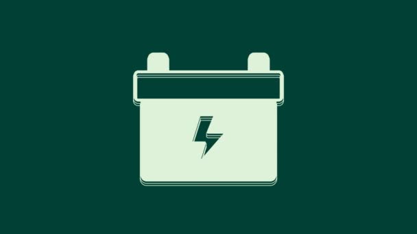 緑の背景に隔離されたホワイトカーのバッテリーアイコン 蓄電池のエネルギー電力と電気蓄電池 4Kビデオモーショングラフィックアニメーション — ストック動画