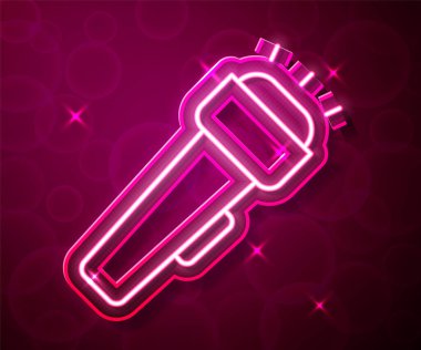 Parlayan neon hattı Flashlight simgesi kırmızı arkaplanda izole edildi. Vektör