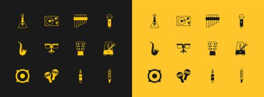 Mikrofon, Maracas, Guitar neck, Audio jack, Bongo drum, Pan flüt, Balalaika ve vinil disk ikonlu Vinil player ayarlayın. Vektör