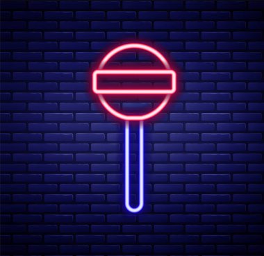 Parlayan neon hattı lolipop ikonu tuğla duvar arka planında izole edildi. Yemek, lezzetli bir sembol. Renkli taslak konsepti. Vektör