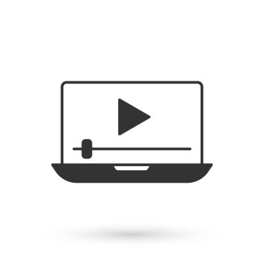 Gri Online video oynatma simgesi beyaz arkaplanda izole edildi. Dizüstü bilgisayar ve oyun işaretli film şeridi. Vektör