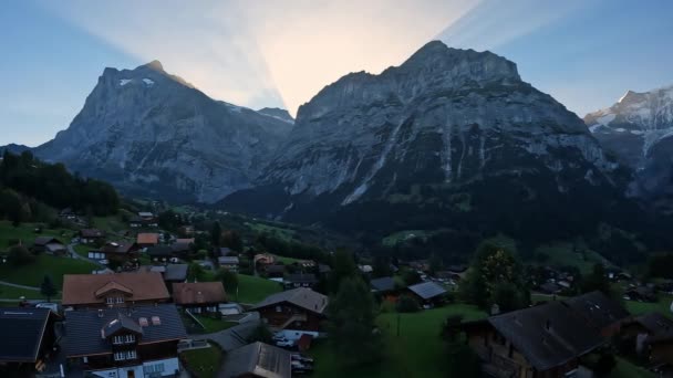 View Tram Moving Grindelwald Switzerland Sun Setting Mountains — Stock Video