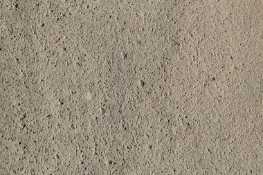 Asfalt yüzeyi yakın çekim ile sabitlendi. Yukarıdan görüntüle.