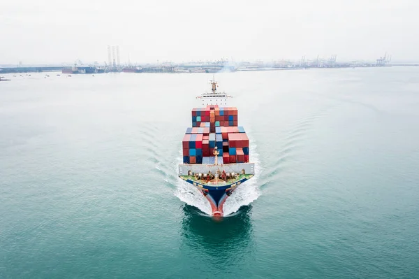 cargo container ship sailing in sea import and export business and industry logistic goods transportation of international by container ship in ocean fright aerial view photograph from drone