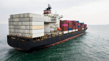 cargo logistic container ship carrying to import export goods and distributing product to dealer and consumers across worldwide, by container ship Transportation in open sea