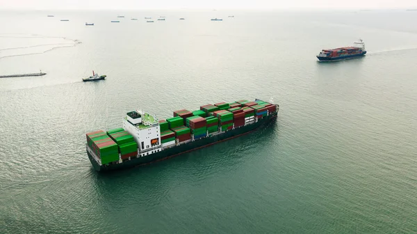 cargo logistic container ship carrying to import export goods and distributing product to dealer and consumers across worldwide, by container ship Transportation in open sea